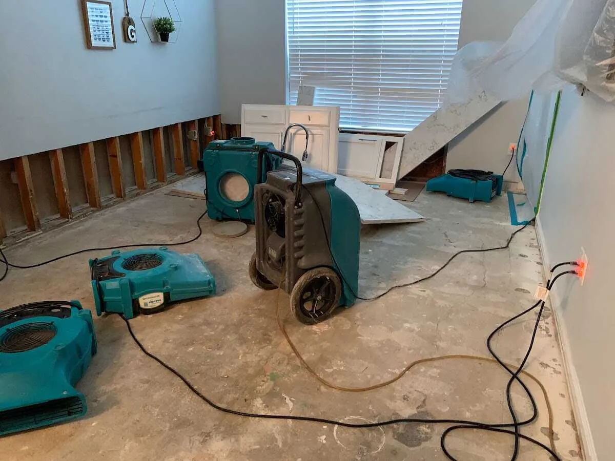 Dehumidifier in flood-cut room for Water Damage Restoration in Cohasset